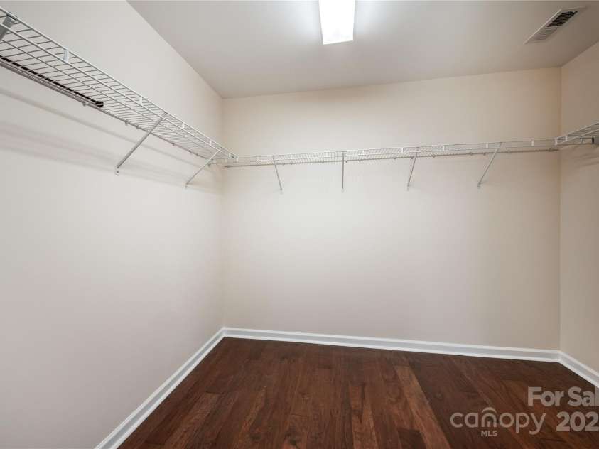 203 Rustling Waters Drive, Mooresville, NC 28117.  MLS# CAR4266533, YatesRealty ID 21811. Expansive primary closet