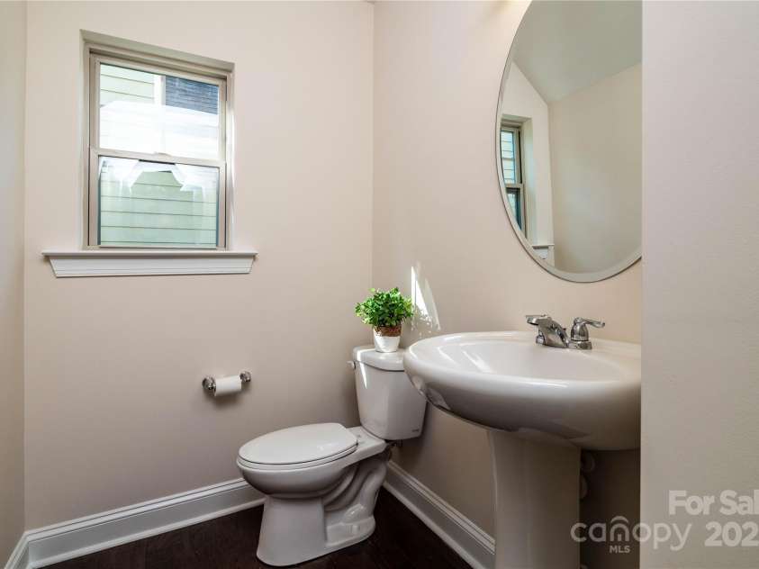 203 Rustling Waters Drive, Mooresville, NC 28117.  MLS# CAR4266533, YatesRealty ID 21811. Half bath on main