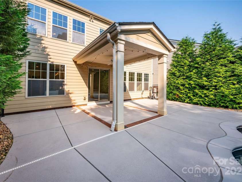 203 Rustling Waters Drive, Mooresville, NC 28117.  MLS# CAR4266533, YatesRealty ID 21811. Lots of patio space for entertaining