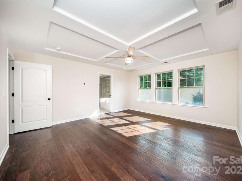 203 Rustling Waters Drive, Mooresville, NC 28117.  MLS# CAR4266533, YatesRealty ID 21811. Primary bedroom