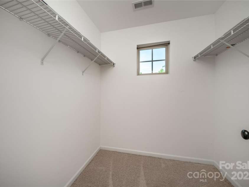203 Rustling Waters Drive, Mooresville, NC 28117.  MLS# CAR4266533, YatesRealty ID 21811. Walk in closet