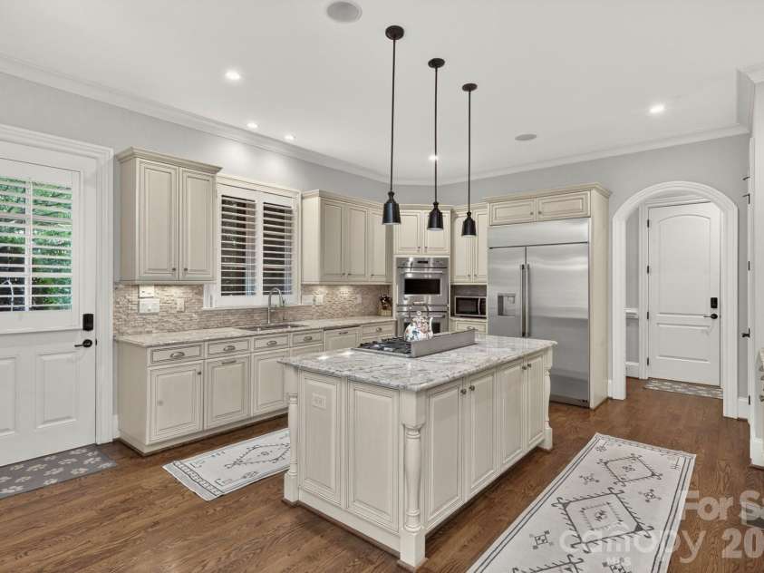 8304 Marcliffe Court, Waxhaw, NC 28173.  MLS# CAR4378365, YatesRealty ID 21811. Access to side screened porch.
