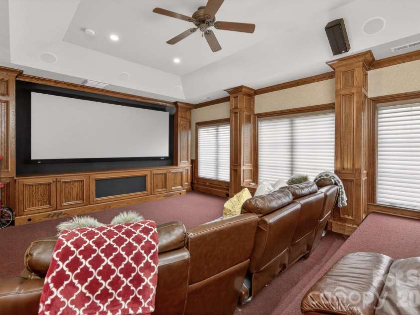 8304 Marcliffe Court, Waxhaw, NC 28173.  MLS# CAR4378365, YatesRealty ID 21811. Upper level movie theater