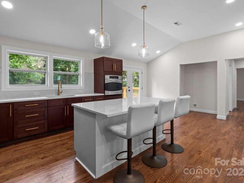1115 Sides Road, Salisbury, NC 28146.  MLS# CAR4271296, YatesRealty ID 21812. Kitchen island with quartz countertops