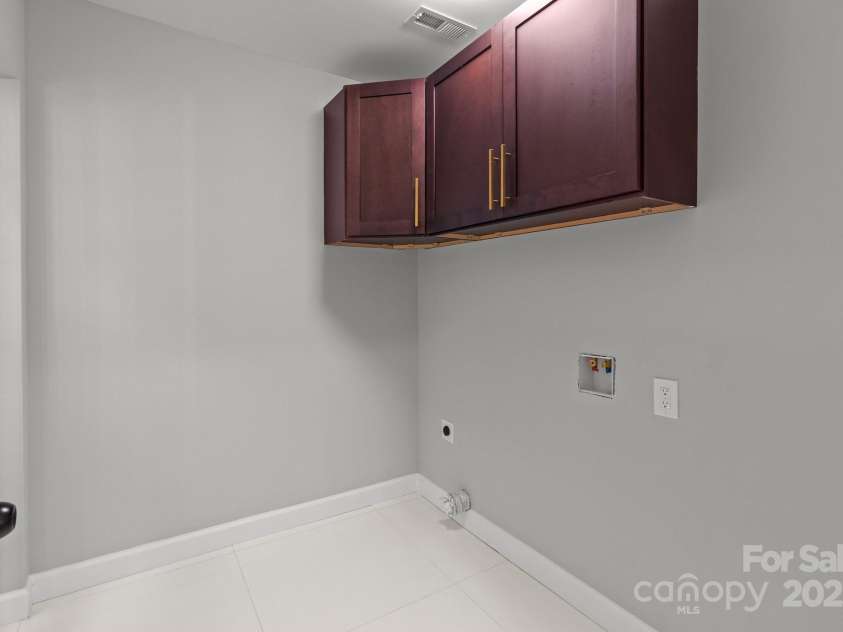 1115 Sides Road, Salisbury, NC 28146.  MLS# CAR4271296, YatesRealty ID 21812. Laundry room