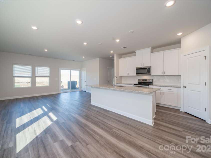 1735 Braemar Village Drive, Monroe, NC 28110.  MLS# CAR4220902, YatesRealty ID 21820. Photo is not of the actual home, but is an inspirational photo of builder’s model home and may depict options, furnishings, and/or decorator features that are not included