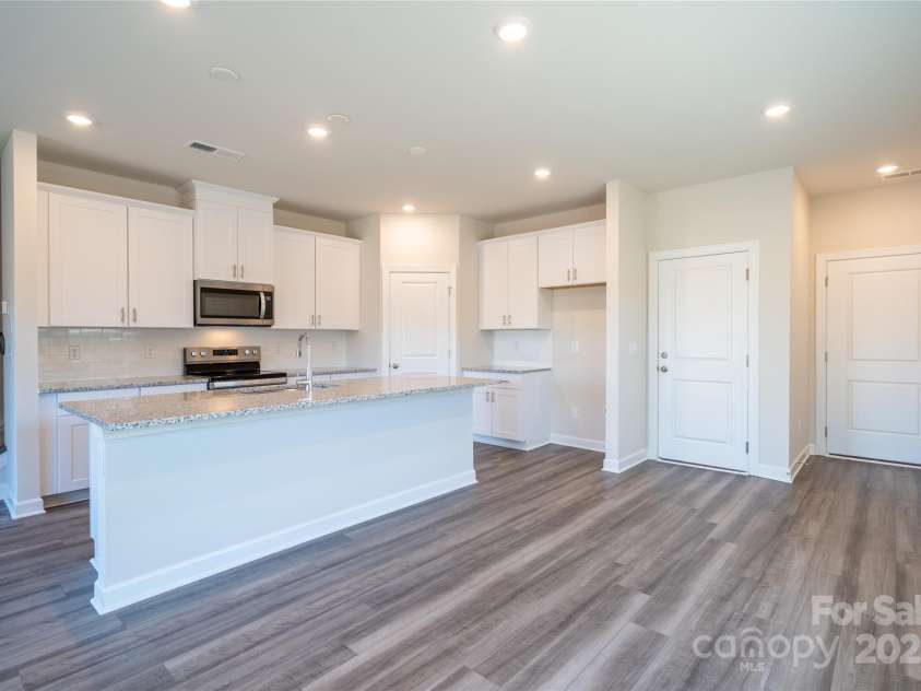 1735 Braemar Village Drive, Monroe, NC 28110.  MLS# CAR4220902, YatesRealty ID 21820. Photo is not of the actual home, but is an inspirational photo of builder’s model home and may depict options, furnishings, and/or decorator features that are not included