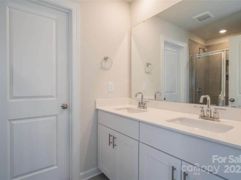 1735 Braemar Village Drive, Monroe, NC 28110.  MLS# CAR4220902, YatesRealty ID 21820. Photo is not of the actual home, but is an inspirational photo of builder’s model home and may depict options, furnishings, and/or decorator features that are not included