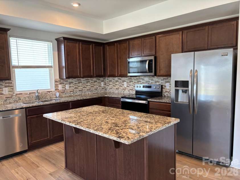 3057 Bell Spur Avenue, Concord, NC 28027.  MLS# CAR4374561, YatesRealty ID 21821. 