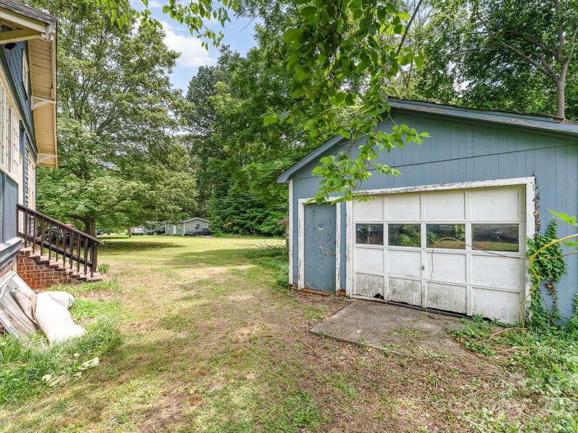 6206 Hunter Avenue, Charlotte, NC 28262.  MLS# CAR4272883, YatesRealty ID 21823. Detached garage sold as is
