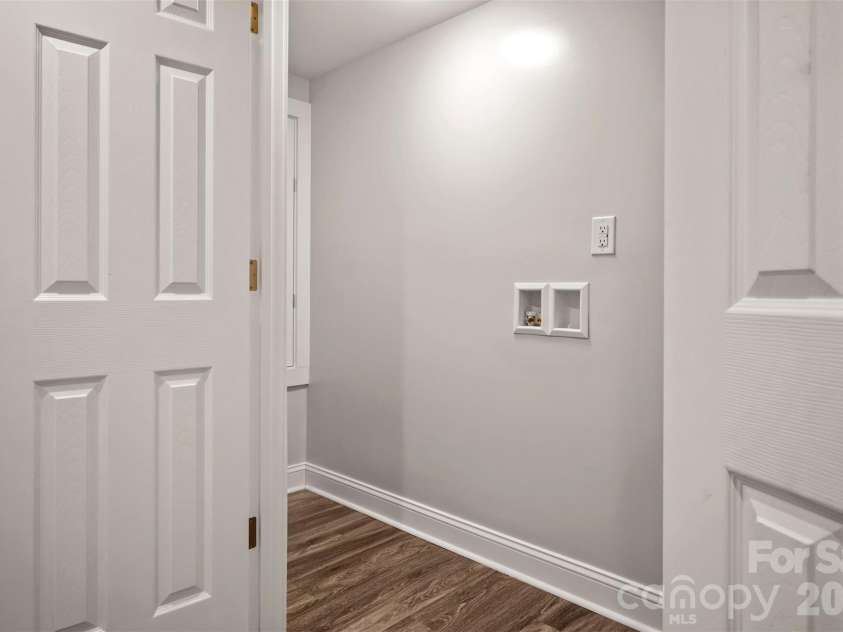 220 Roberson Road, Forest City, NC 28043.  MLS# CAR4381663, YatesRealty ID 21825. Laundry Closet Lower Level