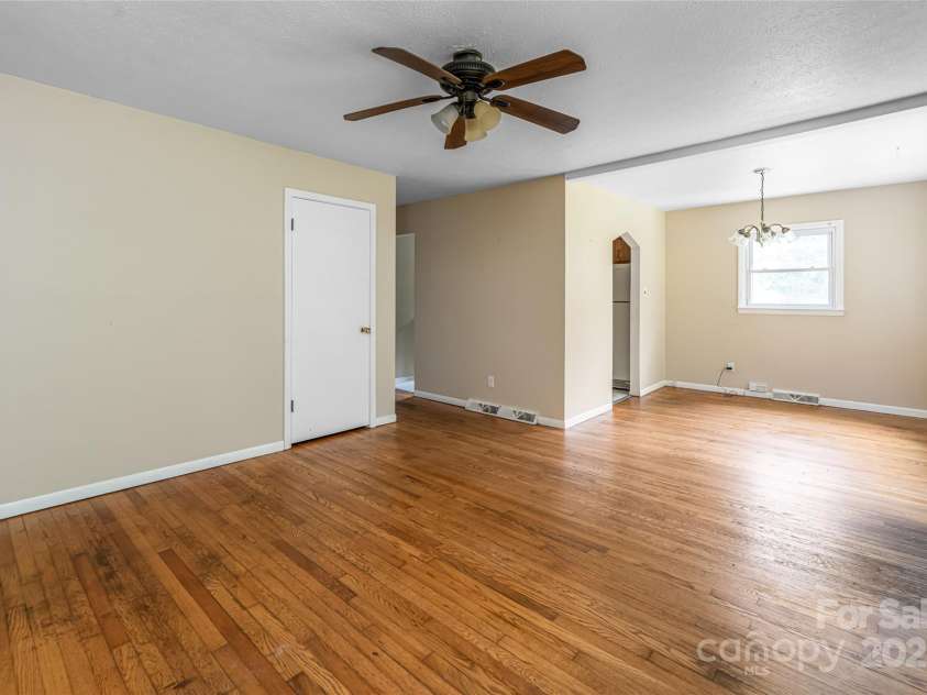 108 Morningside Drive, Asheville, NC 28806.  MLS# CAR4245785, YatesRealty ID 21826. Living room looking towards dining area