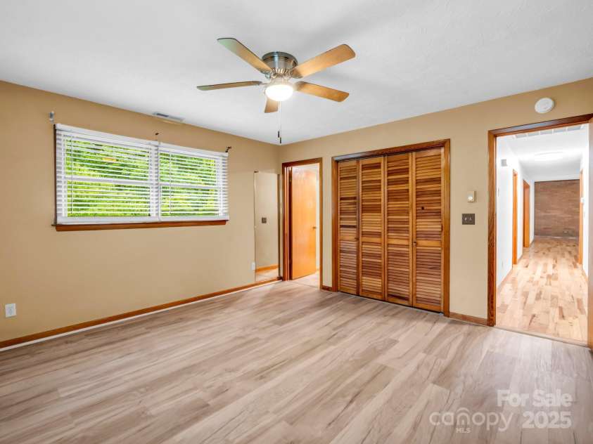 989 Mine Gap Road, Zirconia, NC 28790.  MLS# CAR4264634, YatesRealty ID 21834. Primary bedroom
