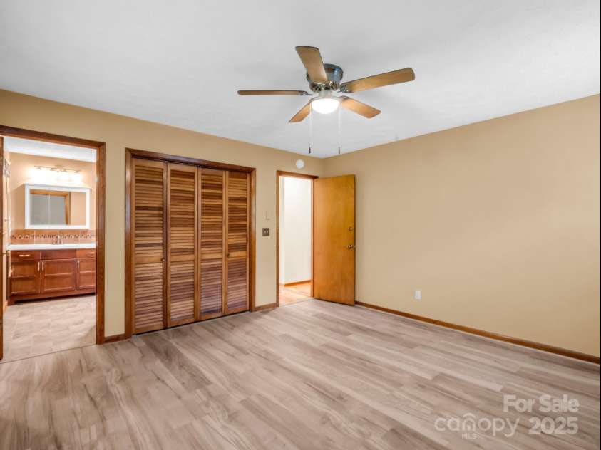 989 Mine Gap Road, Zirconia, NC 28790.  MLS# CAR4264634, YatesRealty ID 21834. Primary bedroom