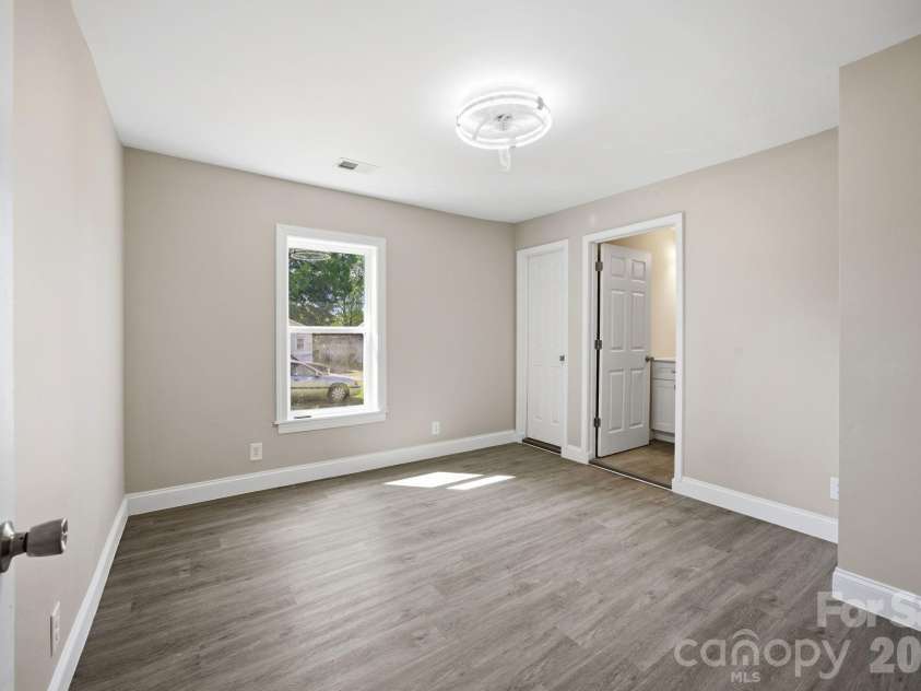 23 Flowe Street, Concord, NC 28027.  MLS# CAR4369550, YatesRealty ID 21836. Primary Bed