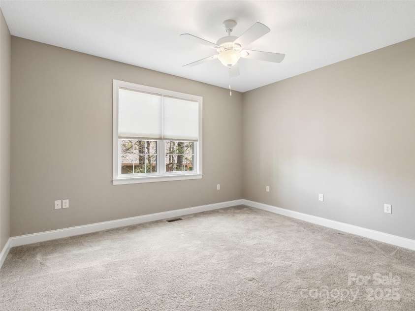 69 Ledgestone Drive, Fairview, NC 28730.  MLS# CAR4246045, YatesRealty ID 21842. Lower level bedroom #3