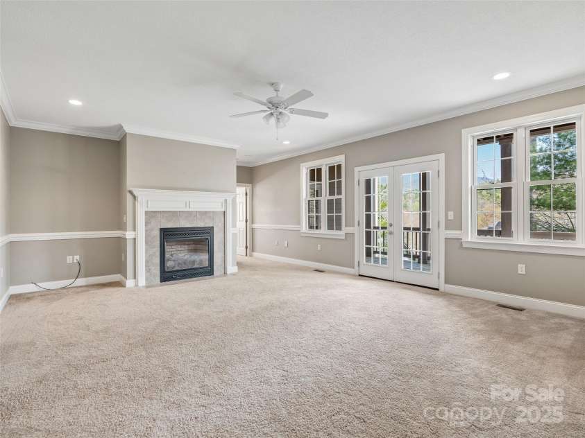 69 Ledgestone Drive, Fairview, NC 28730.  MLS# CAR4246045, YatesRealty ID 21842. Lower level den