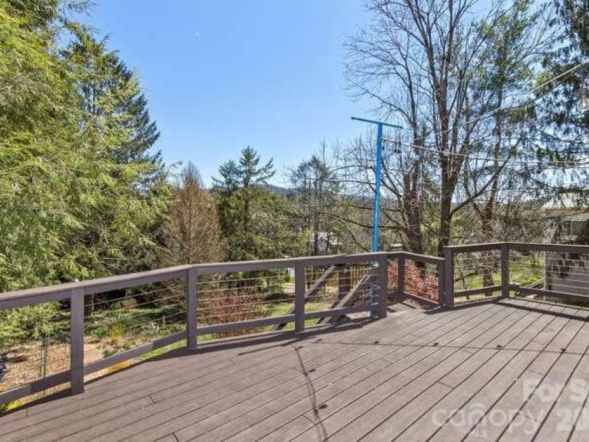 179 Marlborough Road, Asheville, NC 28804.  MLS# CAR4355391, YatesRealty ID 21844. Trex deck for private entertaining.  Overlooks the backyard.