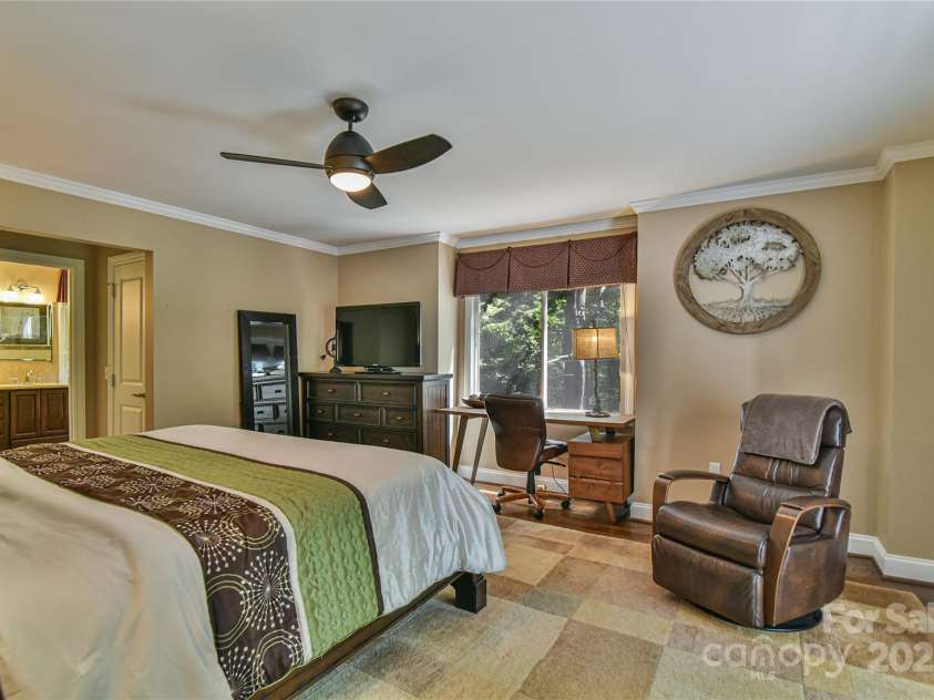 409 North Fork Road, Black Mountain, NC 28711.  MLS# CAR4284708, YatesRealty ID 2185. One of three ensuite bedrooms, this one on the main level. 
