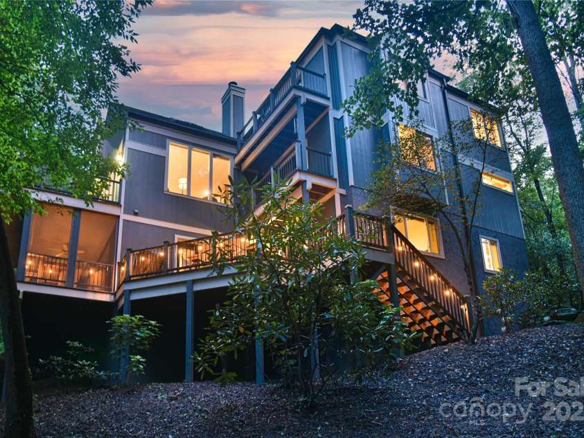 409 North Fork Road, Black Mountain, NC 28711.  MLS# CAR4284708, YatesRealty ID 2185. Privacy and convenience in this one of a kind Black Mountain home.  5 minutes from downtown, 2 minutes from the golf course, but feels worlds away. 