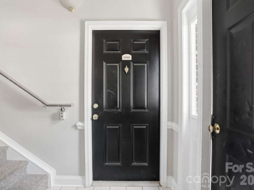 19762 Feriba Place, Cornelius, NC 28031.  MLS# CAR4378752, YatesRealty ID 21850. Interior Door Entrance