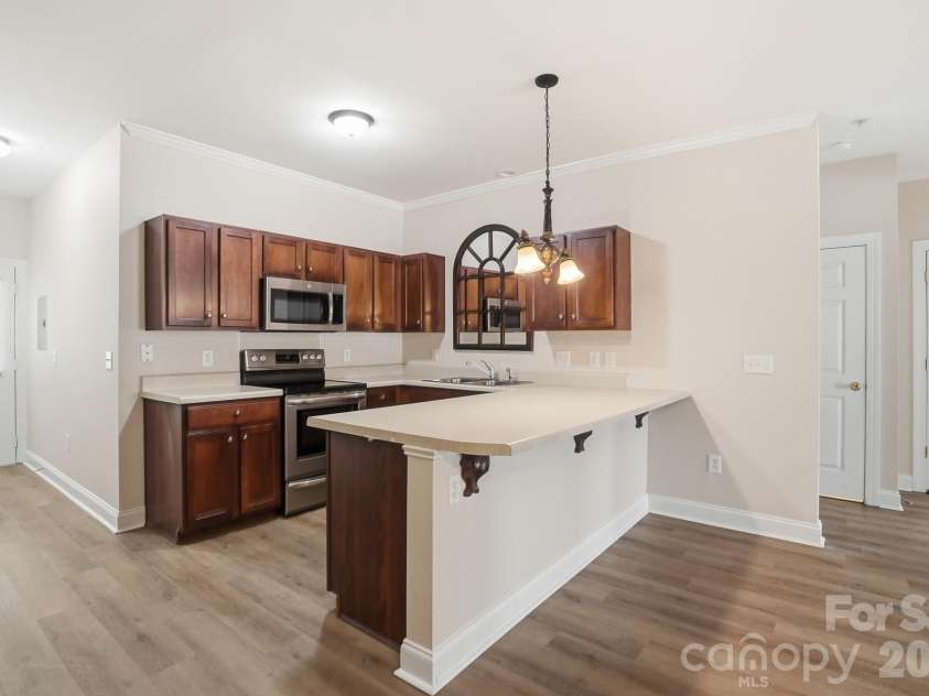 19762 Feriba Place, Cornelius, NC 28031.  MLS# CAR4378752, YatesRealty ID 21850. Kitchen