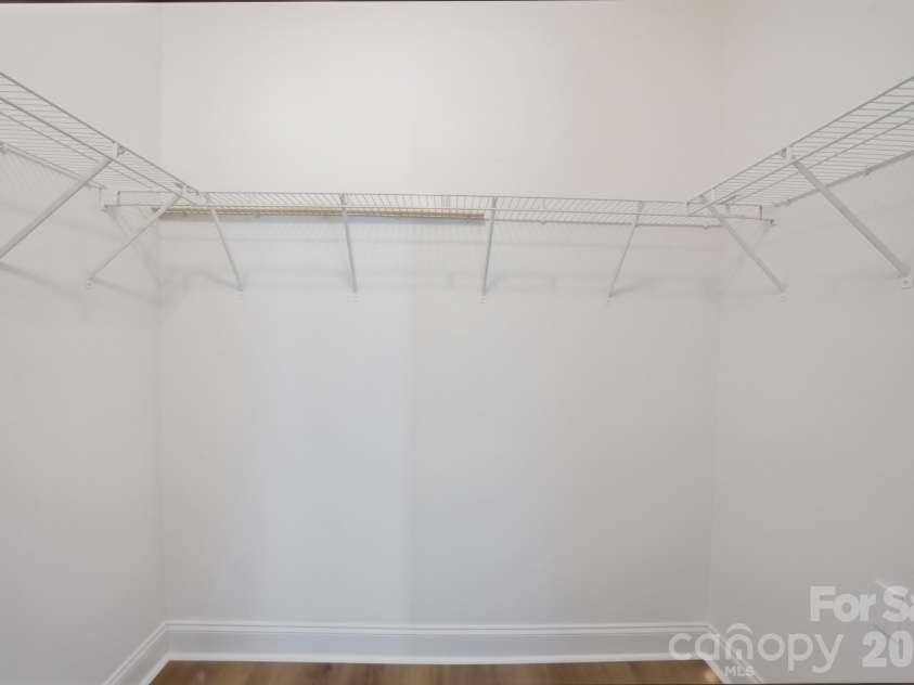 19762 Feriba Place, Cornelius, NC 28031.  MLS# CAR4378752, YatesRealty ID 21850. Primary Walk in closet.