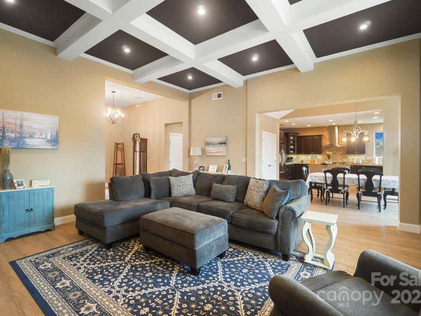 226 Hermance Lane, Mooresville, NC 28117.  MLS# CAR4234805, YatesRealty ID 21851. Living room opens into Kitchen