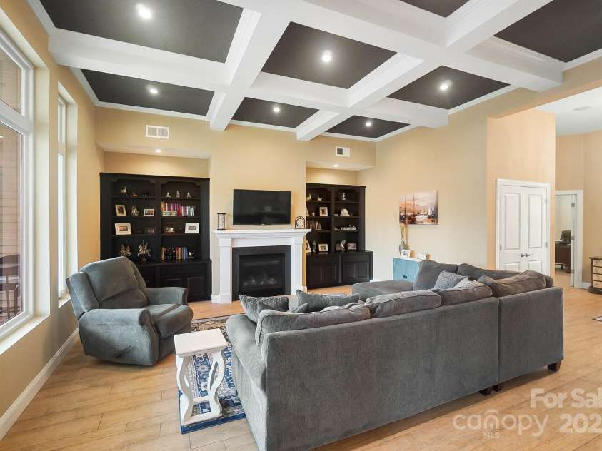 226 Hermance Lane, Mooresville, NC 28117.  MLS# CAR4234805, YatesRealty ID 21851. Living Room with a view and coffered ceiling