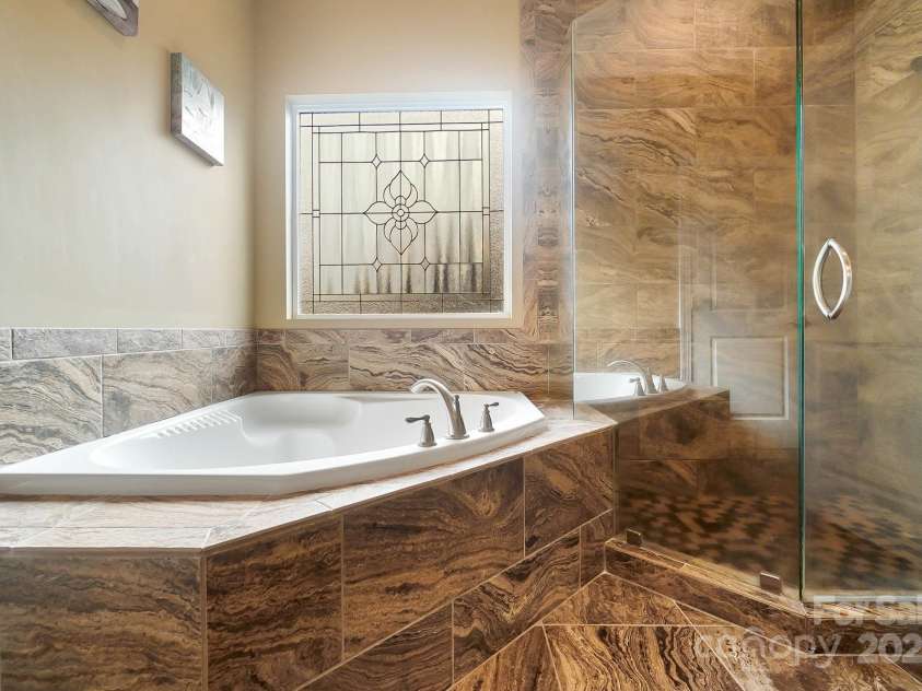 226 Hermance Lane, Mooresville, NC 28117.  MLS# CAR4234805, YatesRealty ID 21851. Soaking Tub and Separate Shower
