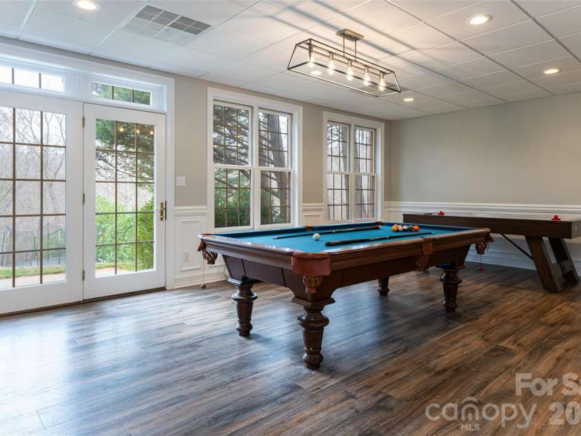 39 Windover Drive, Asheville, NC 28803.  MLS# CAR4352682, YatesRealty ID 21851. Lower recreation room