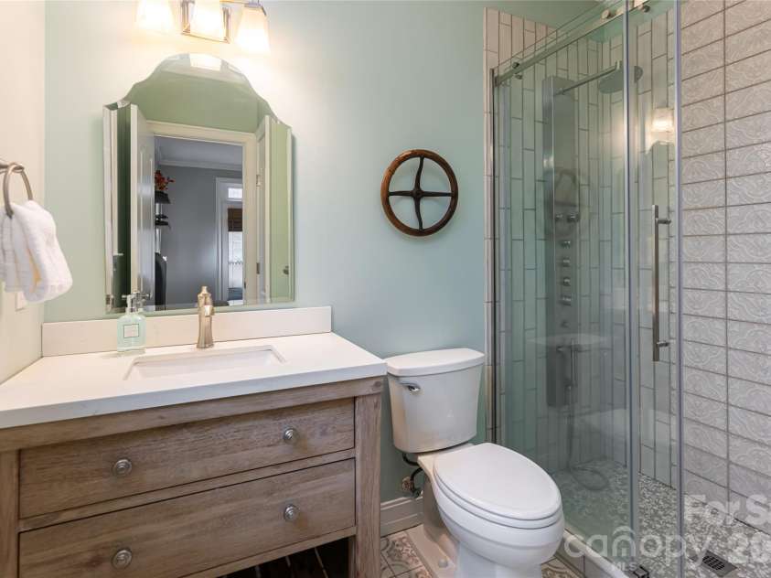 39 Windover Drive, Asheville, NC 28803.  MLS# CAR4352682, YatesRealty ID 21851. Main level guest ensuite