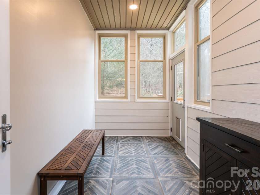 39 Windover Drive, Asheville, NC 28803.  MLS# CAR4352682, YatesRealty ID 21851. Mud room to porch