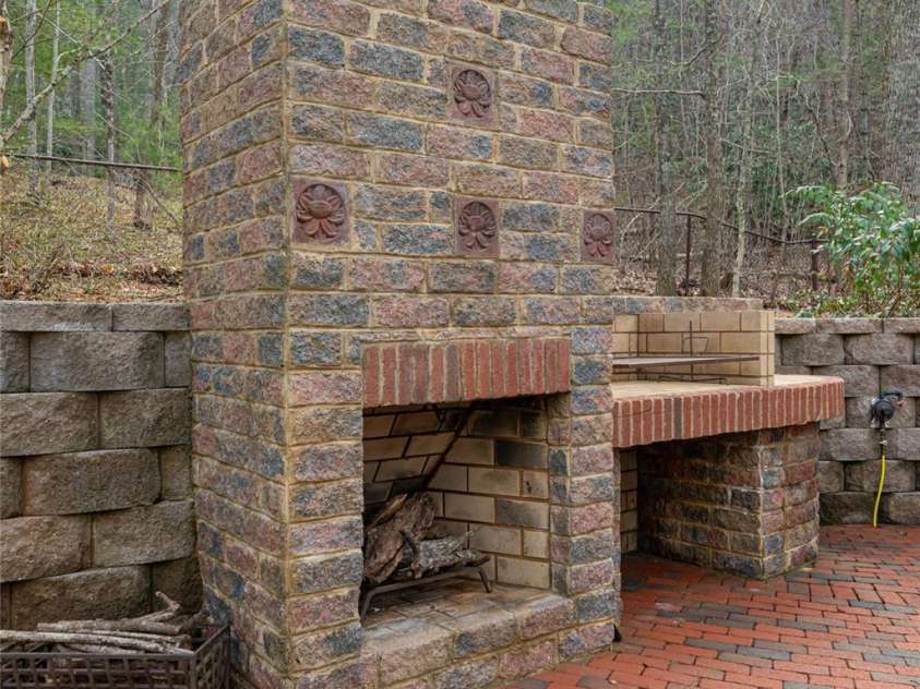 39 Windover Drive, Asheville, NC 28803.  MLS# CAR4352682, YatesRealty ID 21851. Outdoor fireplace detail