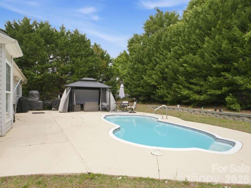 1103 Ross Brook Trace, York, SC 29745.  MLS# CAR4378430, YatesRealty ID 21854. Backyard side view 
