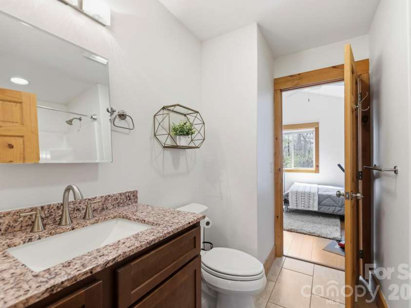 14 Sunny Hollow Lane, Fairview, NC 28730.  MLS# CAR4354531, YatesRealty ID 21859. 