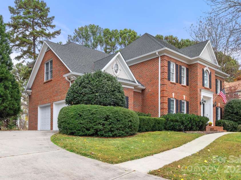 3419 Wylie Meadow Lane, Charlotte, NC 28269.  MLS# CAR4223040, YatesRealty ID 2186. Driveway leading to 2 car oversized garage