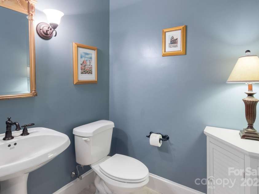 3419 Wylie Meadow Lane, Charlotte, NC 28269.  MLS# CAR4223040, YatesRealty ID 2186. Guest bathroom downstairs