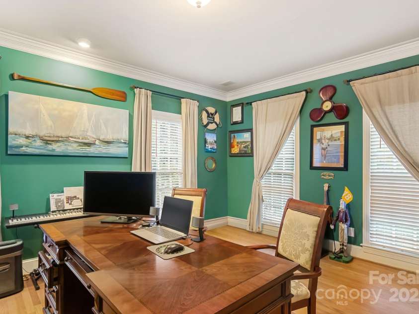 3419 Wylie Meadow Lane, Charlotte, NC 28269.  MLS# CAR4223040, YatesRealty ID 2186. Study with custom bookcases