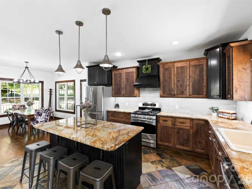 1205 French Belk Road, Mt Ulla, NC 28125.  MLS# CAR4377325, YatesRealty ID 21866. Kitchen and dining
