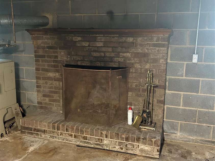4268 Wilkesboro Highway, Statesville, NC 28625.  MLS# CAR4260024, YatesRealty ID 21866. Basement Fireplace 