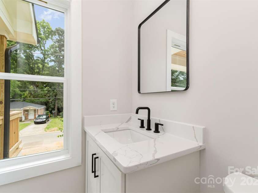 2512 Remington Street, Charlotte, NC 28216.  MLS# CAR4243674, YatesRealty ID 21867. 1st Floor Half Bath