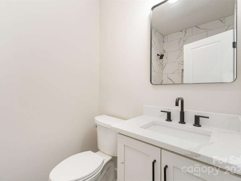 2512 Remington Street, Charlotte, NC 28216.  MLS# CAR4243674, YatesRealty ID 21867. Guest Bathroom- Tub not pictured