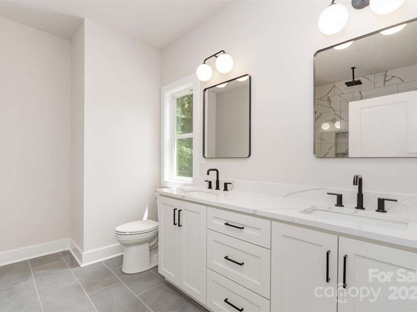 2512 Remington Street, Charlotte, NC 28216.  MLS# CAR4243674, YatesRealty ID 21867. Primary Bathroom