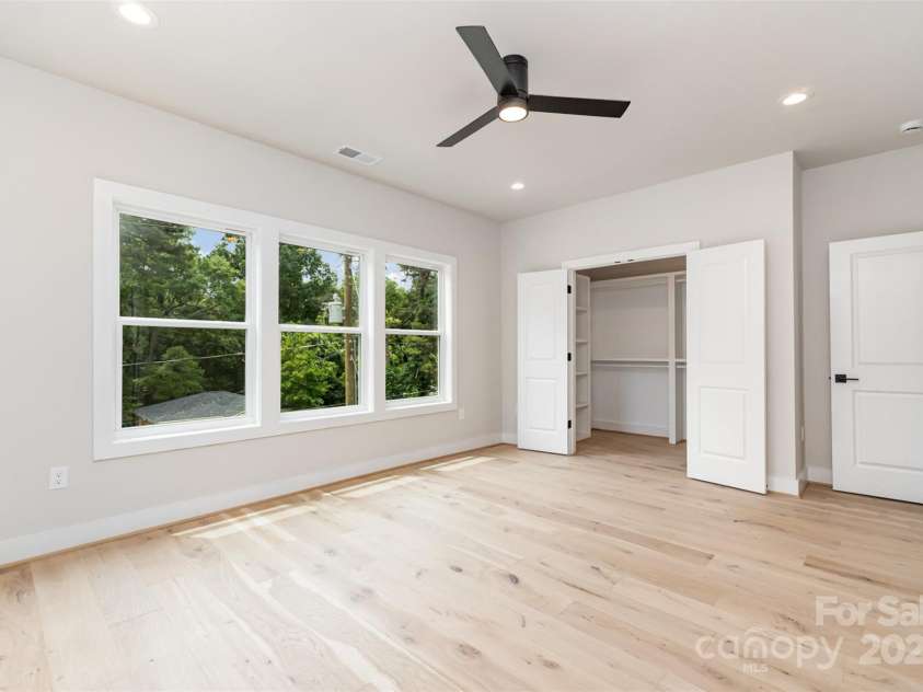 2512 Remington Street, Charlotte, NC 28216.  MLS# CAR4243674, YatesRealty ID 21867. Primary Bedroom Walk-in-Closet