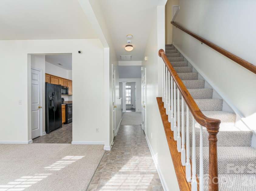 115 Autumn Falls Drive, Lake Wylie, SC 29710.  MLS# CAR4318027, YatesRealty ID 2187. Dining Room, Hall and Stairs