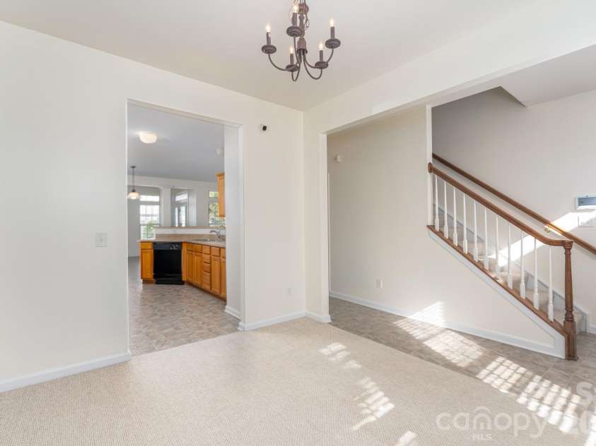 115 Autumn Falls Drive, Lake Wylie, SC 29710.  MLS# CAR4318027, YatesRealty ID 2187. Dining room out to Kitchen