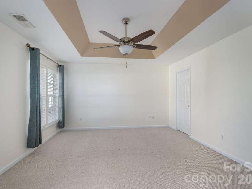 115 Autumn Falls Drive, Lake Wylie, SC 29710.  MLS# CAR4318027, YatesRealty ID 2187. Owners Suite Bedroom