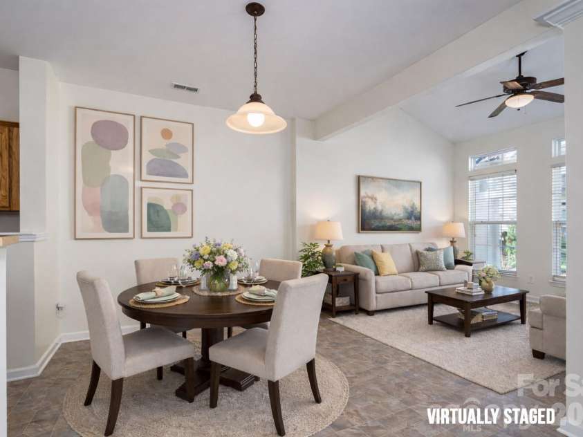 115 Autumn Falls Drive, Lake Wylie, SC 29710.  MLS# CAR4318027, YatesRealty ID 2187. Staged Bfast and Living Room, lots of sun.