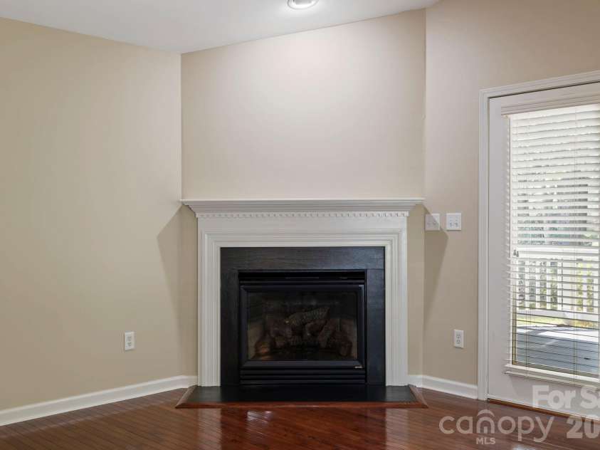 241 Fairway View Drive, Etowah, NC 28729.  MLS# CAR4304614, YatesRealty ID 2187. Gas log fireplace in Great room